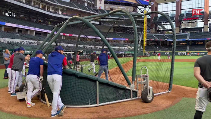 Rangers Brad Miller Takes Batting Practice in Jeans